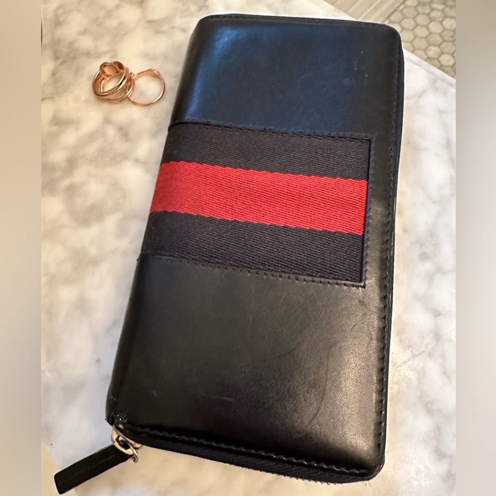Gucci Wallet - Black Leather Full Zip Wallet. Red stripe